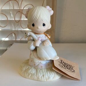 Vintage Precious Moments girl with goose figurine, 1980